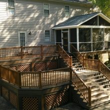 Screened porch with custom Trex door and wood ceiling Screened porch with custom Trex door and wood ceiling